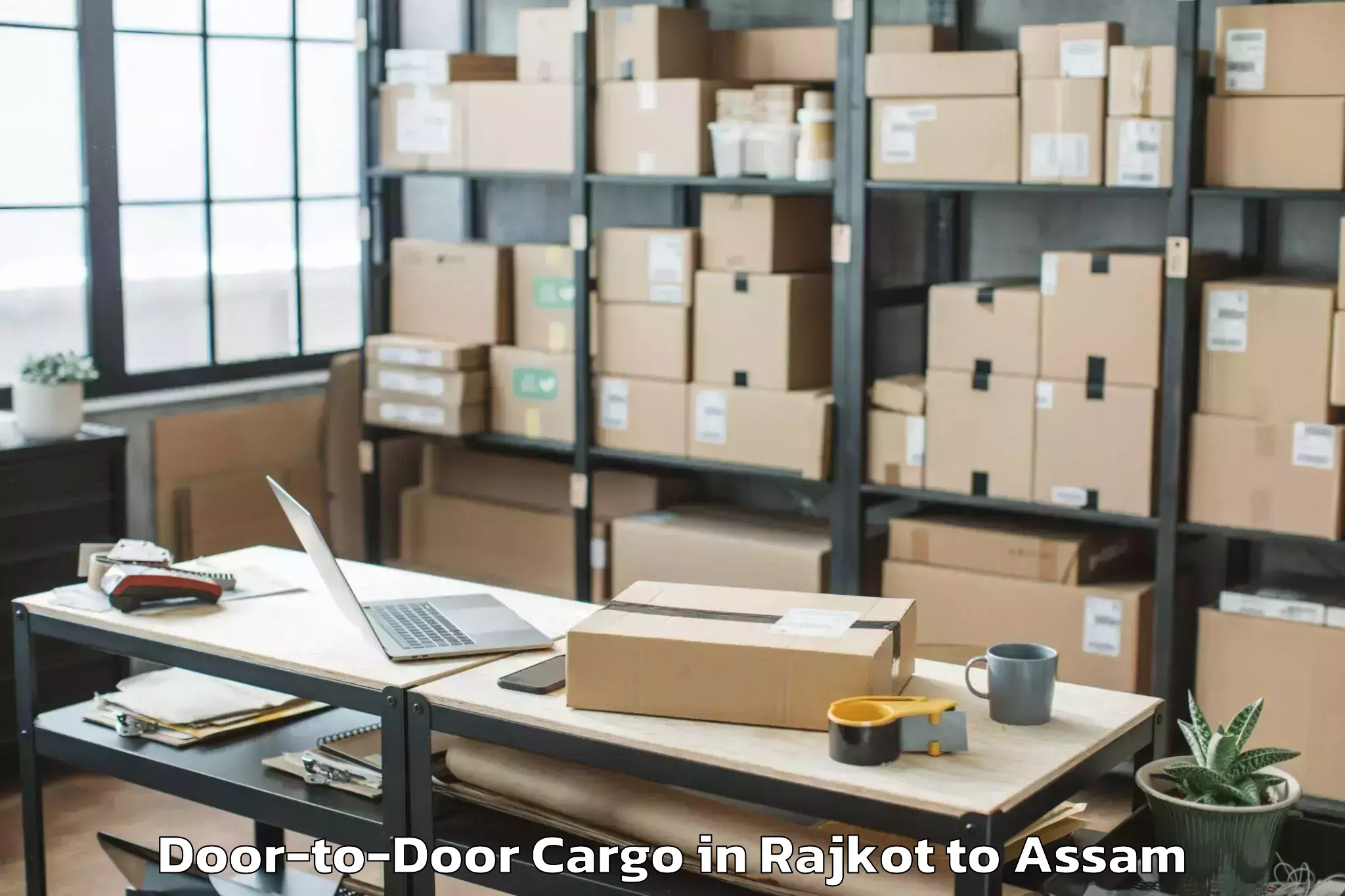 Book Rajkot to Phuloni Door To Door Cargo Online